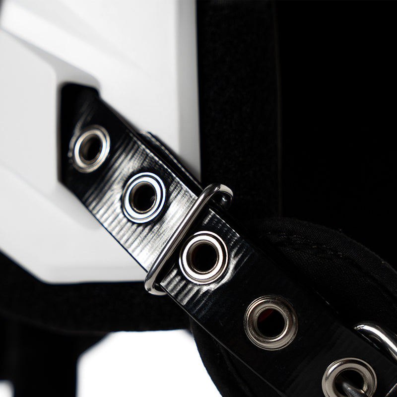 Battle Defender shoulder pads closeup of the elastic belt strap and grommet hardware